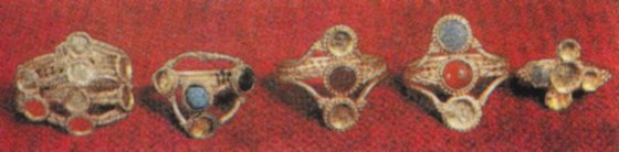 Gold finger rings, inlaid with semiprecious stones, from III